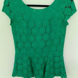 Emerald green, lace, peplum top.
